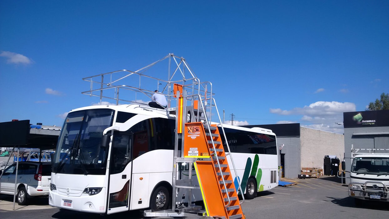 AHP-Monkey-w-Safe-T-Cell-working-on-bus-roof-sml