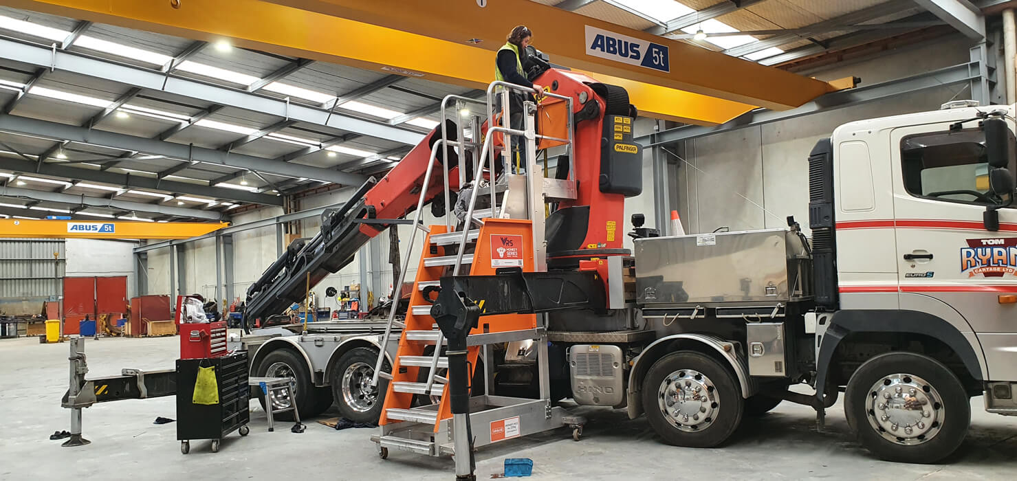 AHP-Monkey-working-on-truck-hiab-sml